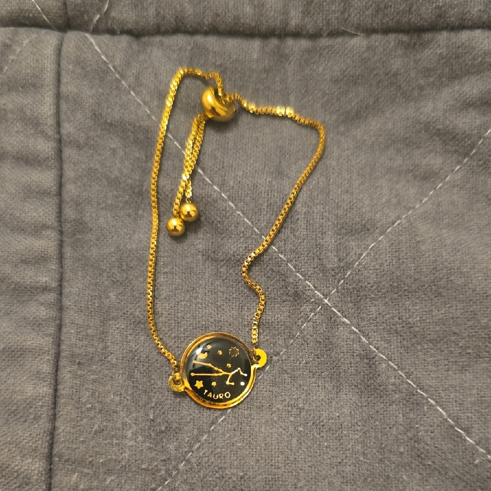 Gold Zodiac Bracelet with Black Tauro Pendant